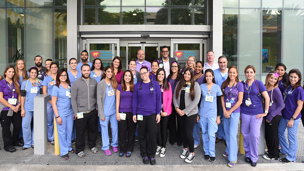 employees of the emergency team in their color coded uniforms