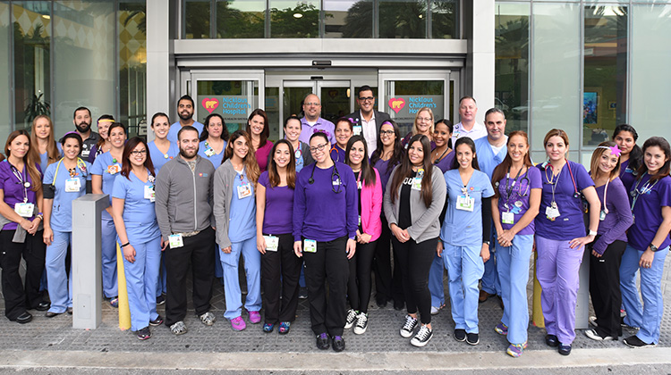 employees of the emergency team in their color coded uniforms